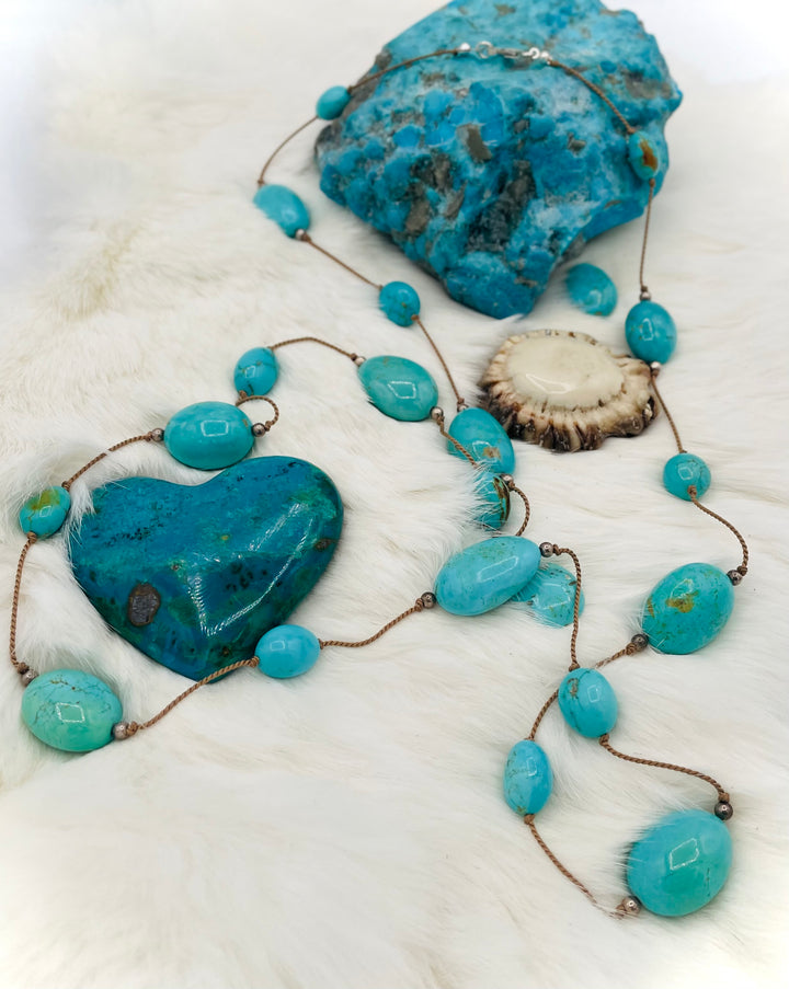 Silk knotted necklace featuring Kingman turquoise nuggets and sterling silver rounds on silk cord. Available only from Rockstar Cowgirl online or in store in Cody, Wyoming.