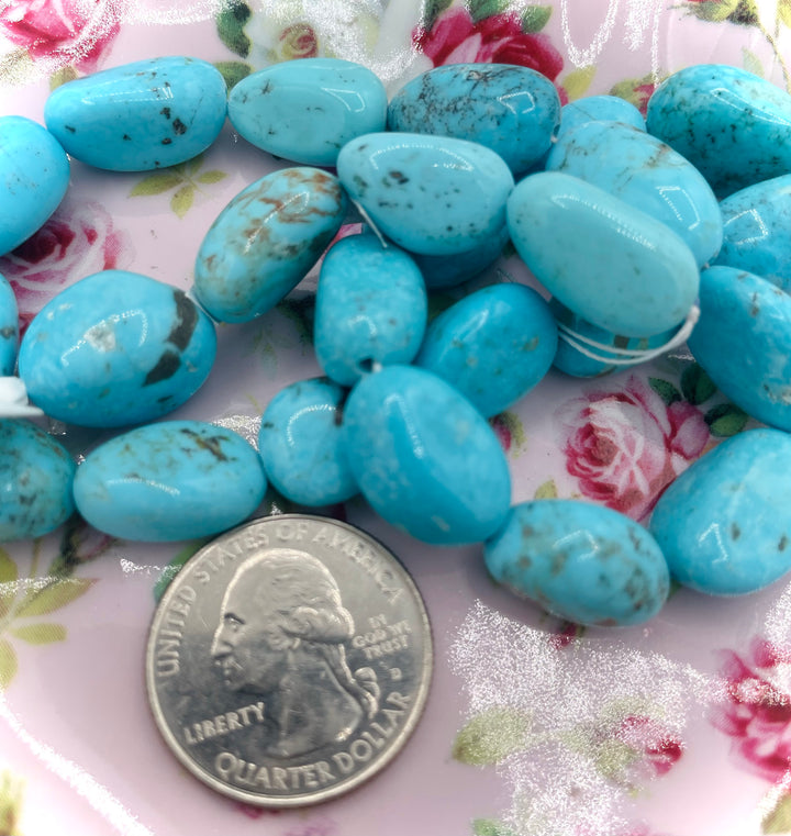 Campitos turquoise nuggets 16 inch bead strand. U.S. quarter for size reference. Available only from Rockstar Cowgirl online or in store in Cody, Wyoming.