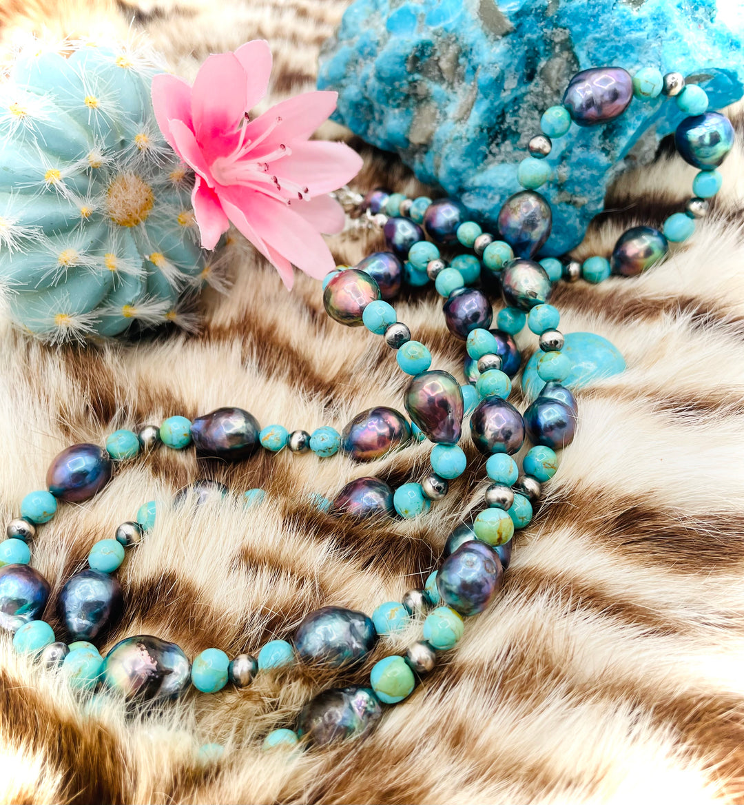 Beaded invention necklace featuring Kingman turquoise, peacock pearls, sterling silver beads, sterling silver swivel lobsters, eyeglass loops, and cell phone case attachment bracket. Available only from Rockstar Cowgirl online or in store in Cody, Wyoming. 