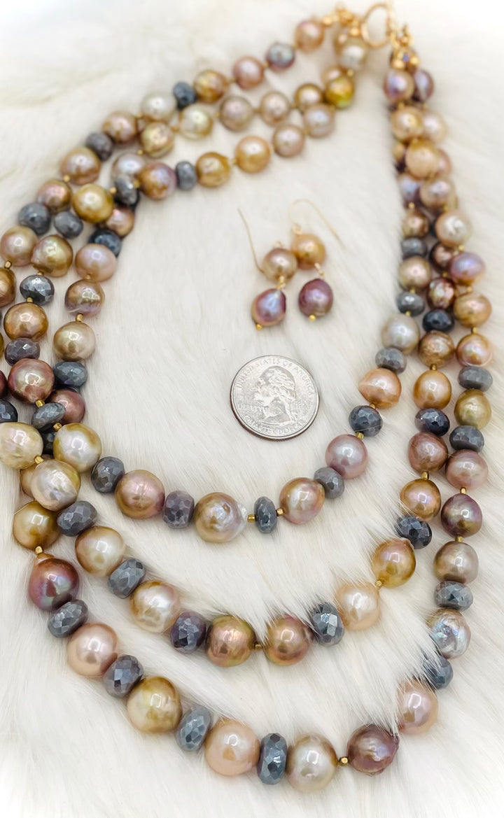 Beaded 2 strand necklace featuring natural luster pearls, grey silverite, and bronze accents with matching earrings. U.S. quarter for size reference. Available only from Rockstar Cowgirl online or in store in Cody, Wyoming.