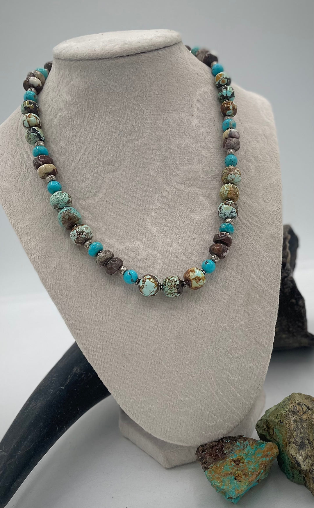 Handmade beaded necklace featuring natural cloud mountain Hubei turquoise, turquoise rounds, wild horse magnesite, and sterling silver beads. Available only from Rockstar Cowgirl online or in store in Cody, Wyoming.