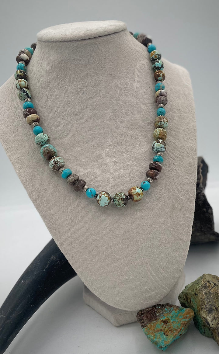 Handmade beaded necklace featuring natural cloud mountain Hubei turquoise, turquoise rounds, wild horse magnesite, and sterling silver beads. Available only from Rockstar Cowgirl online or in store in Cody, Wyoming.