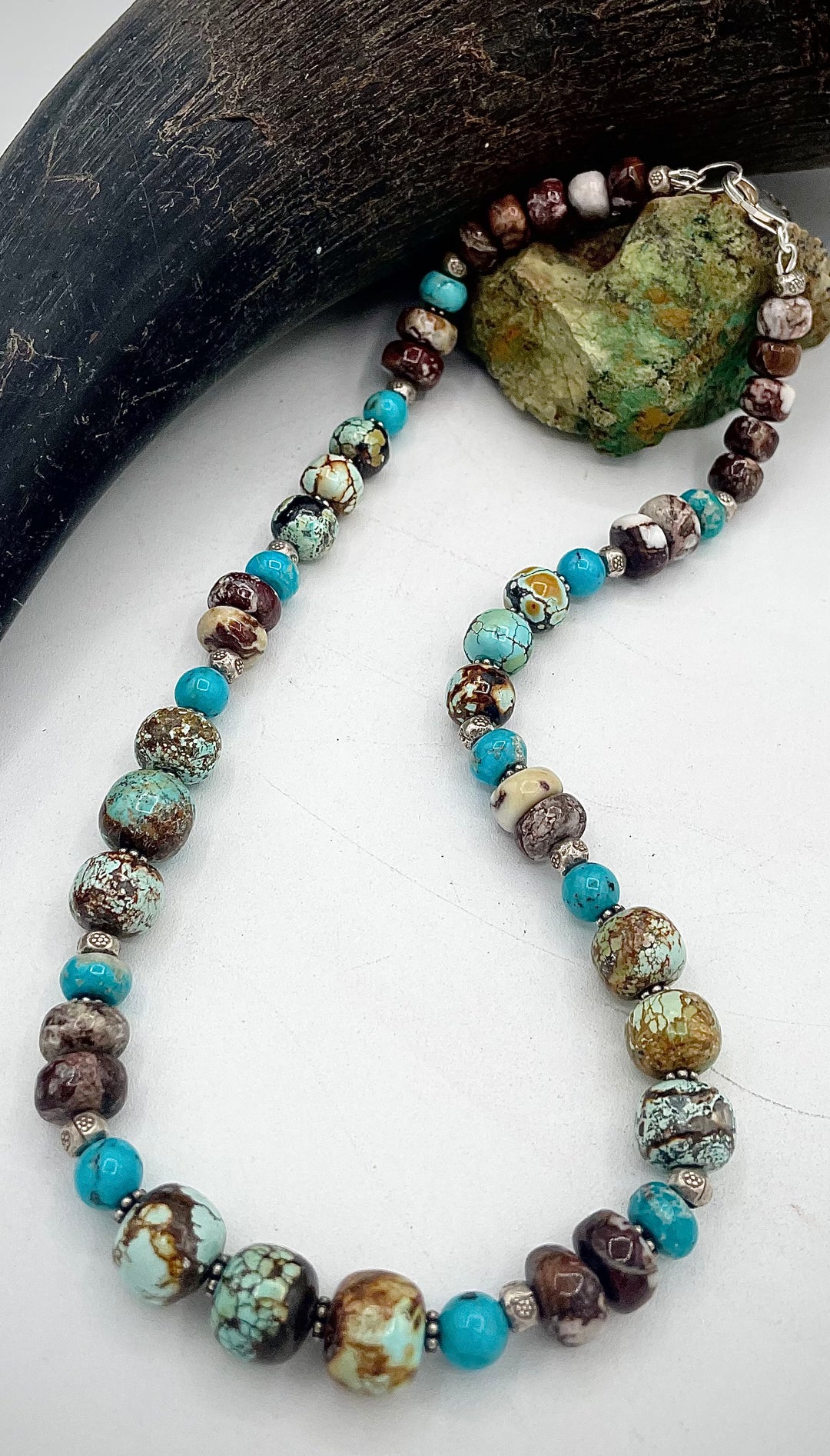 Handmade beaded necklace featuring natural cloud mountain Hubei turquoise, turquoise rounds, wild horse magnesite, and sterling silver beads. Available only from Rockstar Cowgirl online or in store in Cody, Wyoming.