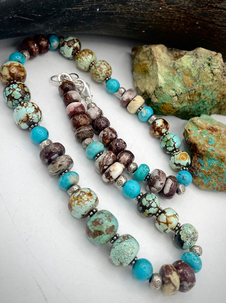 Handmade beaded necklace featuring natural cloud mountain Hubei turquoise, turquoise rounds, wild horse magnesite, and sterling silver beads. Available only from Rockstar Cowgirl online or in store in Cody, Wyoming.