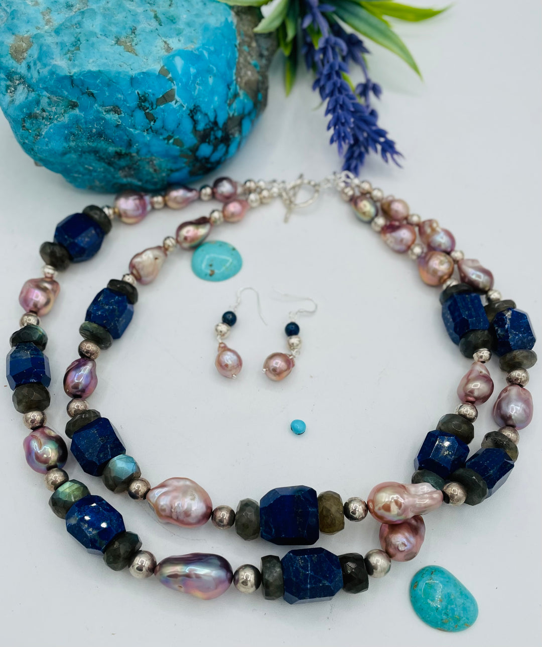 Beaded double stranded necklace featuring lapis, natural luster baroque pearls, labradorite, and sterling silver beads. Matching earrings included. Available only from Rockstar Cowgirl online or in store in Cody, Wyoming.