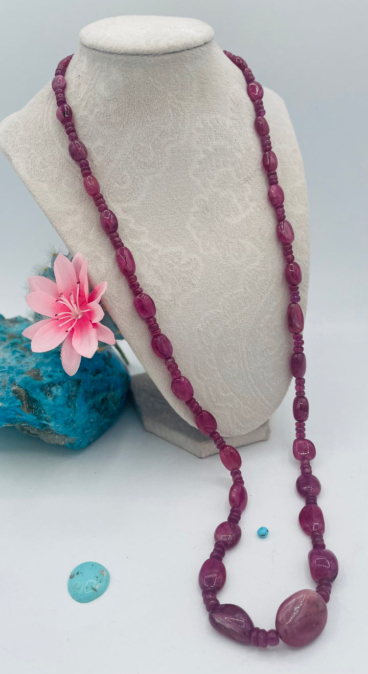 Long beaded necklace featuring natura ruby nuggets and rondelles. Available only from Rockstar Cowgirl online or in store in Cody, Wy.