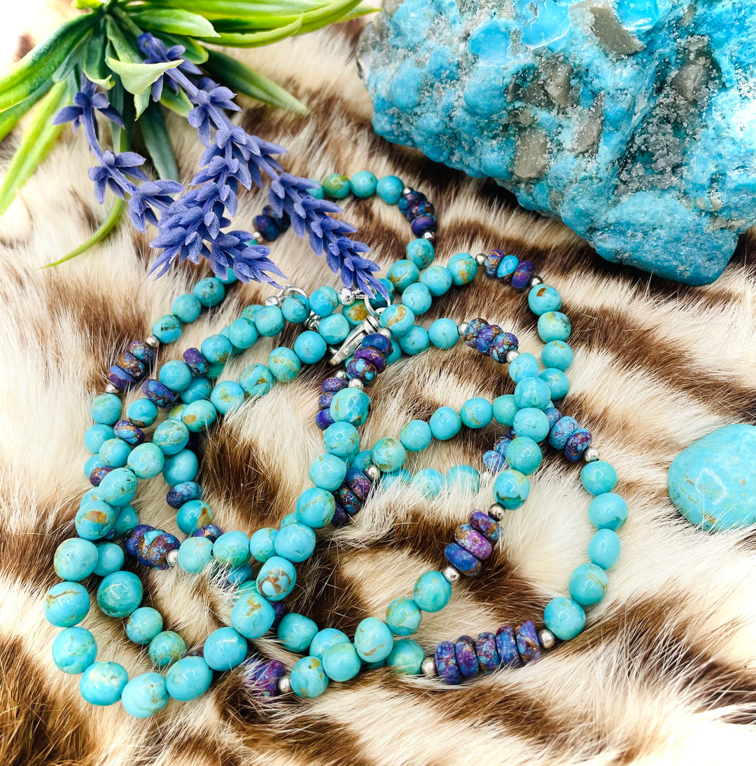 Beaded invention necklace featuring Kingman turquoise, purple Mojave turquoise, sterling silver beads, sterling silver swivel lobsters, eye glasses loops, cell phone case attachment bracket. Available only from Rockstar Cowgirl online or in store in Cody, Wyoming.
