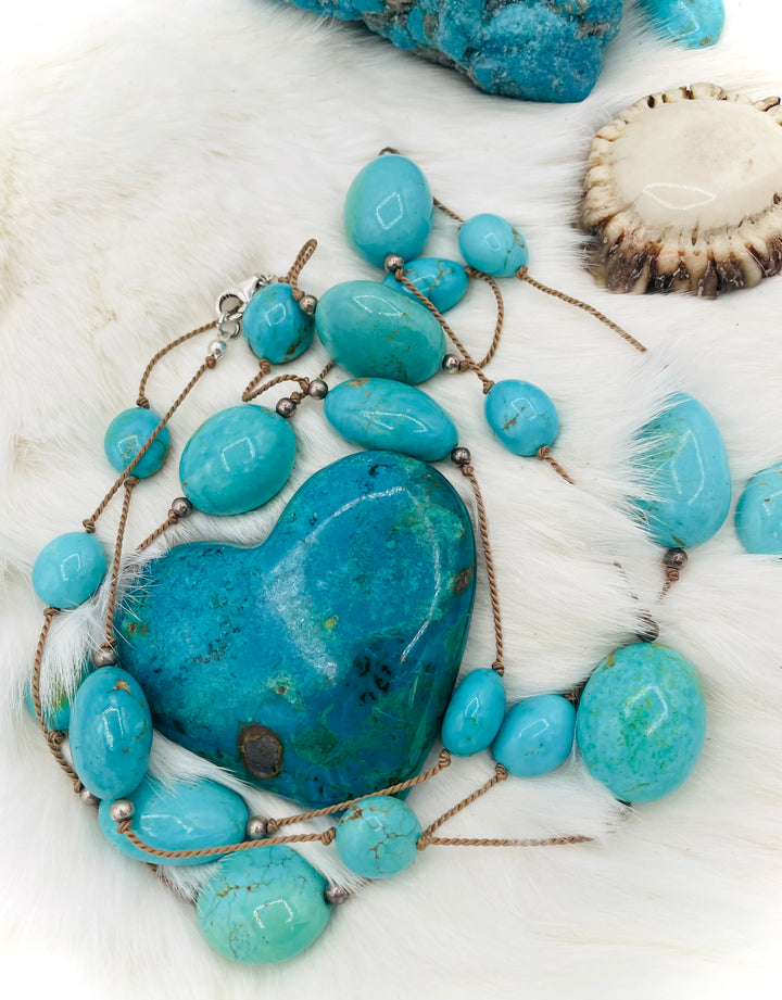 Silk knotted necklace featuring Kingman turquoise nuggets and sterling silver rounds on silk cord. Available only from Rockstar Cowgirl online or in store in Cody, Wyoming.