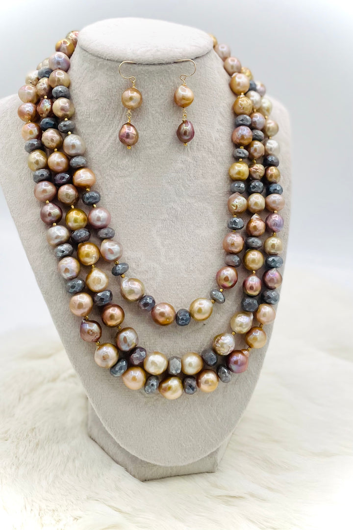Beaded 2 strand necklace featuring natural luster pearls, grey silverite, and bronze accents with matching earrings. Available only from Rockstar Cowgirl online or in store in Cody, Wyoming.