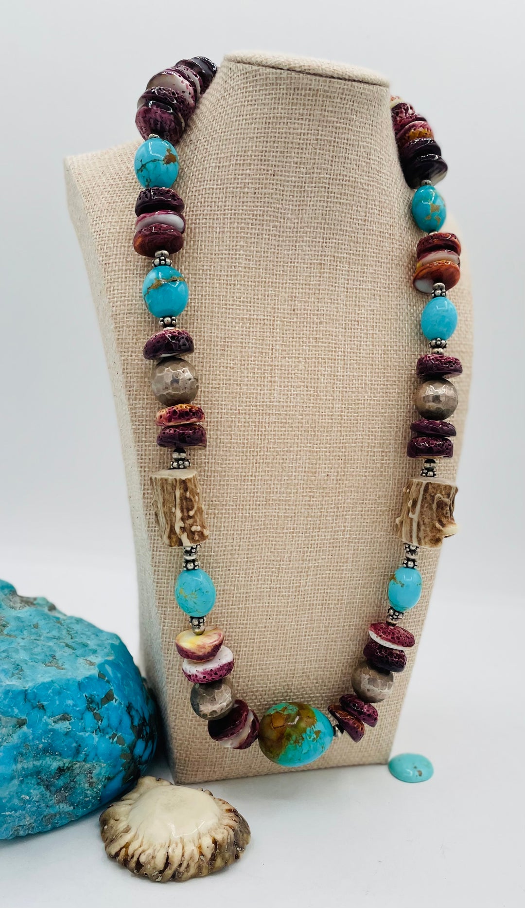 Beaded necklace featuring Antler beads, purple spiney oyster, Kingman turquoise nuggets, and sterling silver beads. Available only from Rockstar Cowgirl online or in store in Cody, Wyoming.