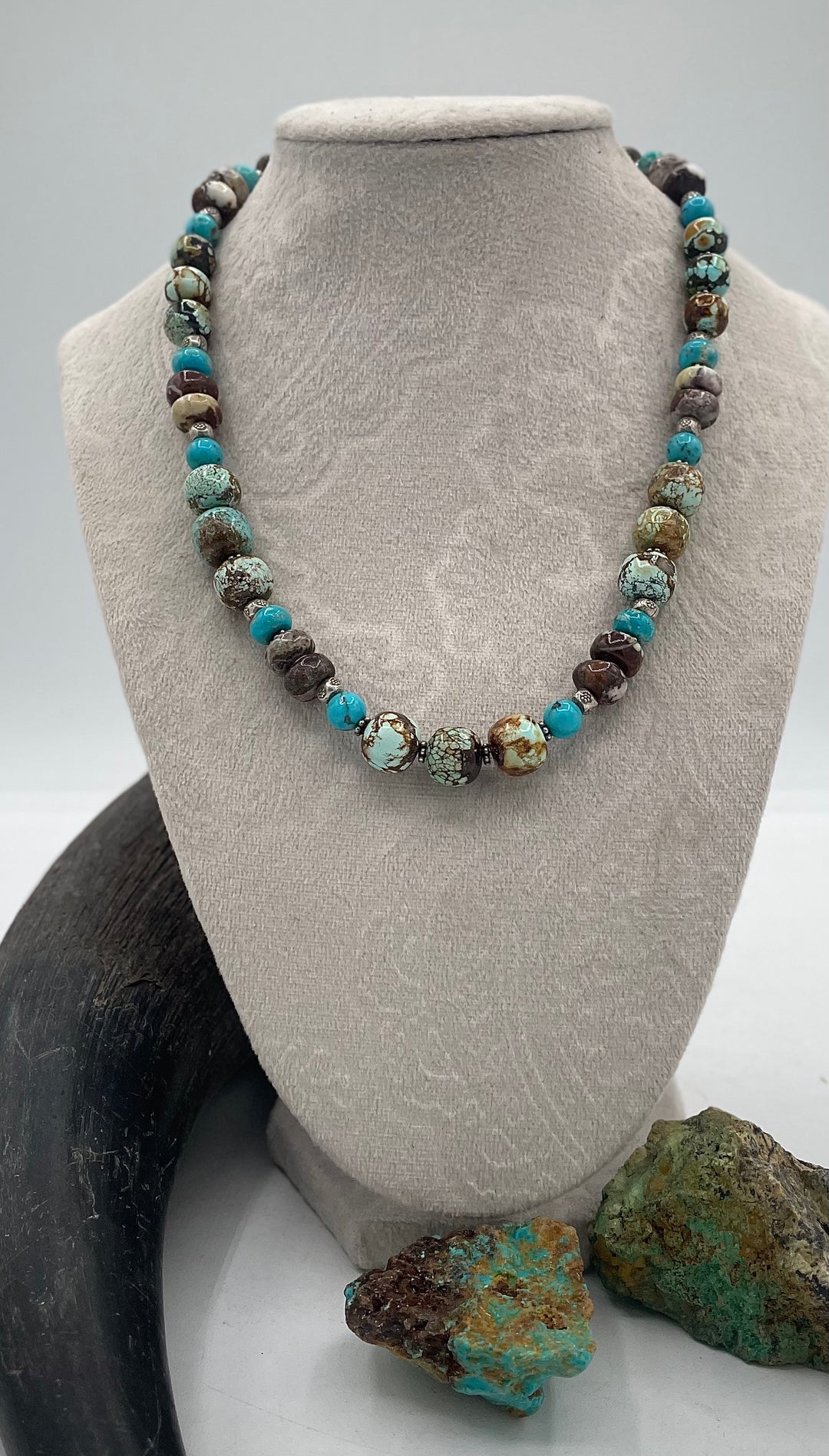 Handmade beaded necklace featuring natural cloud mountain Hubei turquoise, turquoise rounds, wild horse magnesite, and sterling silver beads. Available only from Rockstar Cowgirl online or in store in Cody, Wyoming.