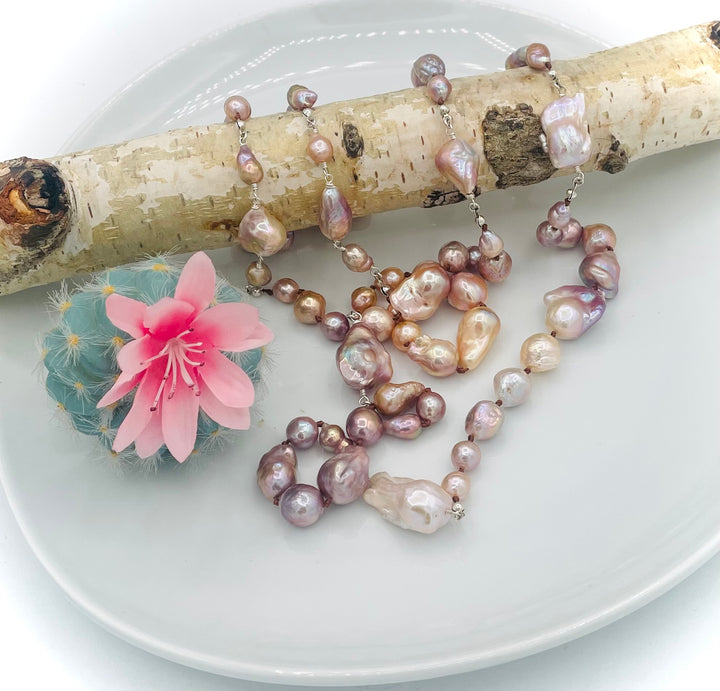 Silk knotted and wire wrapped long treasure necklace featuring natural luster, baroque, Flameball, and Edison pearls with sterling silver accents. Available only from Rockstar Cowgirl online or in store in Cody, Wyoming.