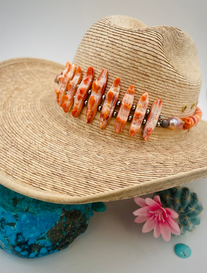 Adjustable beaded hatband featuring spiney oyster, natural luster flameball pearls, sterling silver beads, and finished with deer lace in the back. Available only from Rockstar Cowgirl online or in store in Cody, Wyoming.