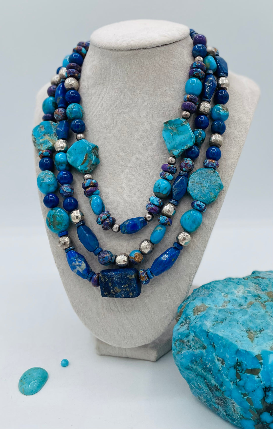 Chunky 3 strand beaded necklace featuring lapis, purple Mojave turquoise, sterling silver beads, Ithaca Peak turquoise, and Kingman turquoise. Available only from Rockstar Cowgirl online or in store in Cody, Wyoming.