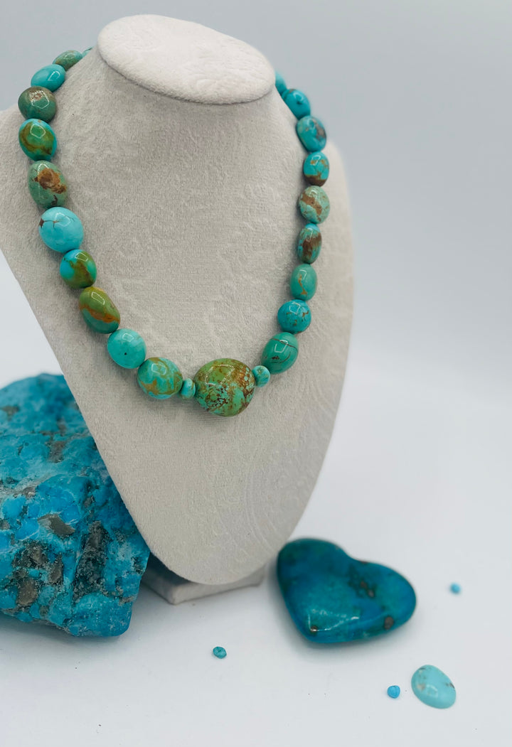 Graduated beaded necklace featuring Kingman turquoise with gold matrix in shades of blue and green. Available only from Rockstar Cowgirl online or in store in Cody, Wyoming.
