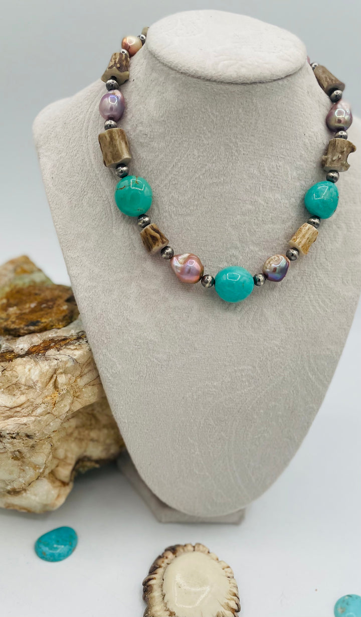 Beaded necklace featuring Kingman turquoise, natural luster pearls, deer antler, and sterling silver beads. Available only from Rockstar Cowgirl online or in store in Cody, Wyoming.