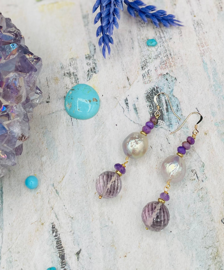 Decadent 3 strand necklace set with matching earrings. Featuring giant flameball natural luster pearls, giant Edison natural luster pearls, pearl discs, pink amethyst, ametrine, and phosphosiderite. Available only from Rockstar Cowgirl online or in store in Cody, Wyoming.