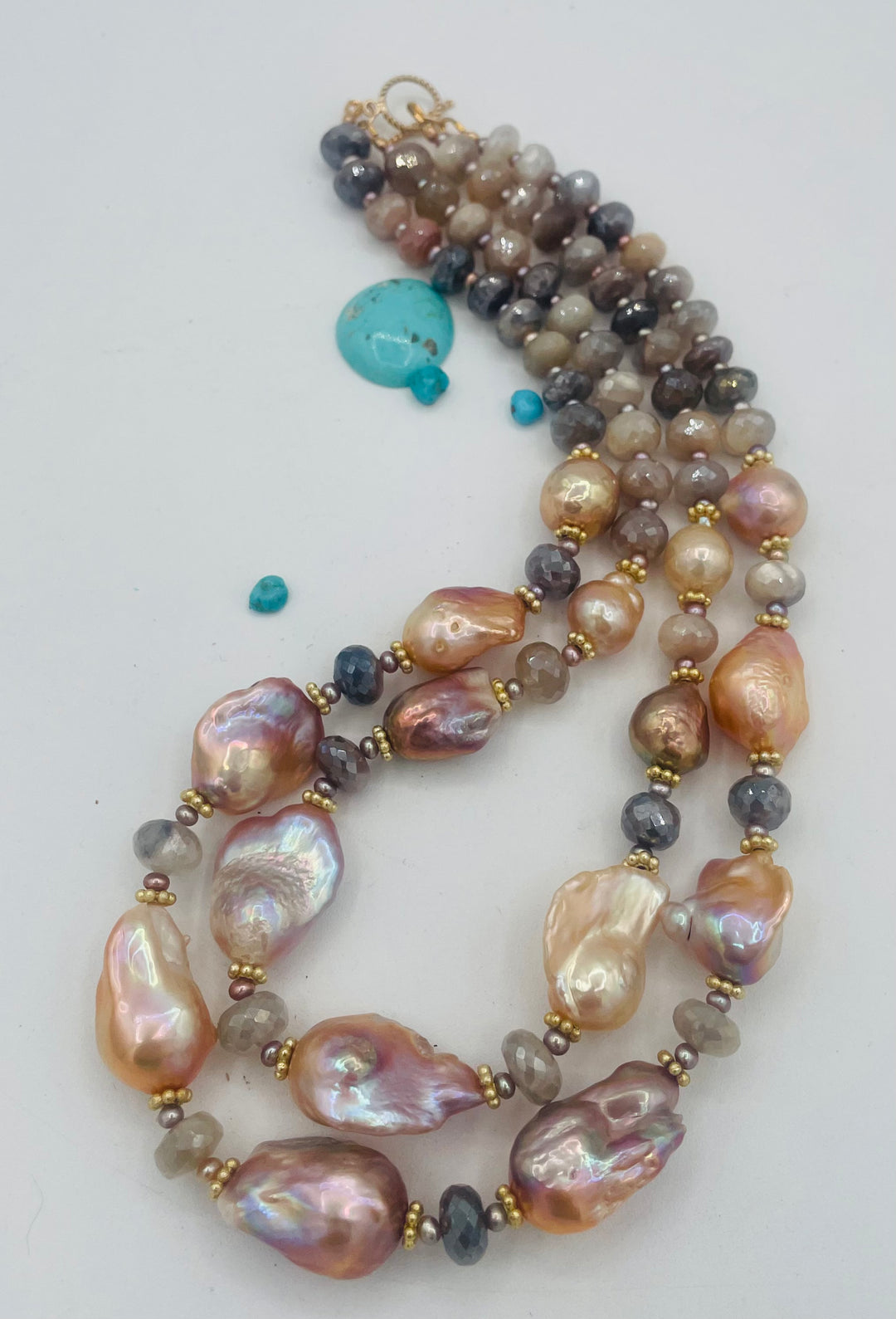 Double strand beaded necklace featuring Flameball baroque natural luster pearls, faceted Multi colored moonstone, and tiny pink pearls. Available only from Rockstar Cowgirl online or in store in Cody, Wyoming.