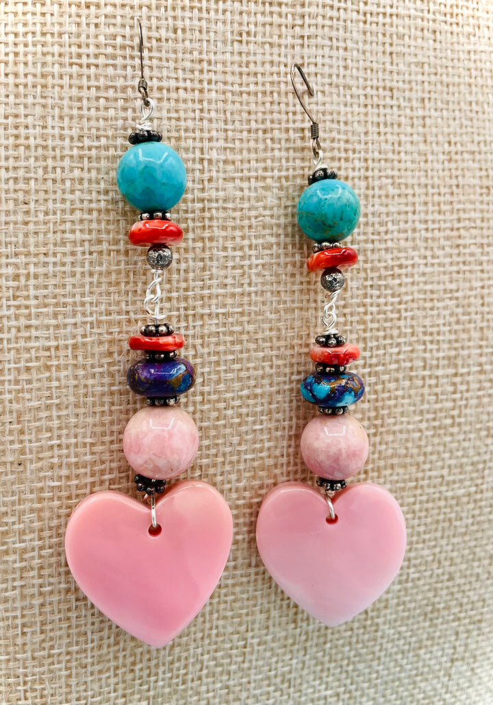 Handmade earrings featuring pink conch shell hearts, rhodochrosite, purple Mojave/ Mohave Kingman turquoise, and spiny oyster beads.  Available only from Rockstar Cowgirl online or in store in Cody, Wyoming.