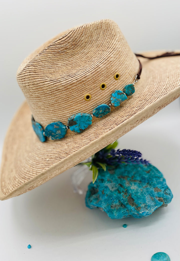 Beaded adjustable hatband that doubles as a necklace featuring Ithaca Peak turquoise and sterling silver Navajo pearl beads with deer lace in the back. Available only from Rockstar Cowgirl online or in store in Cody, Wyoming. 