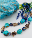 Necklace featuring Kingman turquoise, purple Mojave turquoise, rough deer antler, lapis, and sterling silver beads. Available only from Rockstar Cowgirl online or in store in Cody, Wyoming.