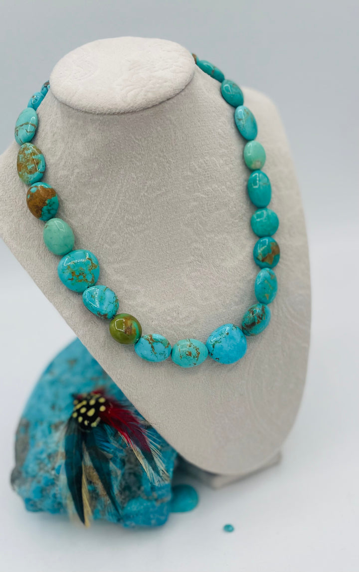 Graduated beaded necklace featuring Kingman turquoise with gold matrix in shades of blue and green. Available only from Rockstar Cowgirl online or in store in Cody, Wyoming.