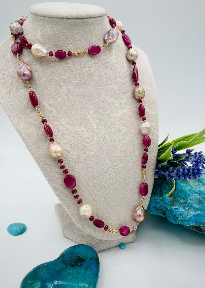 Silk knotted treasure necklace featuring rubies and natural luster Edison pearls. Available only from Rockstar Cowgirl online or in store in Cody, Wyoming.