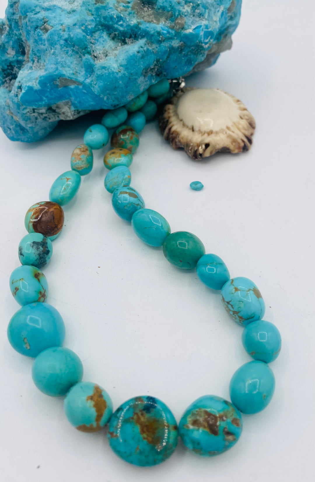 Graduated beaded necklace featuring Kingman turquoise with gold matrix in shades of blue and green. Available only from Rockstar Cowgirl online or in store in Cody, Wyoming.