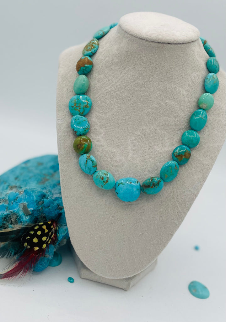 Graduated beaded necklace featuring Kingman turquoise with gold matrix in shades of blue and green. Available only from Rockstar Cowgirl online or in store in Cody, Wyoming.
