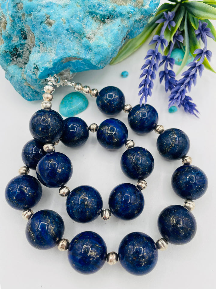 Beaded necklace featuring large Afghan lapis round beads with sterling silver beads between. Available only from Rockstar Cowgirl online or in store in Cody, Wyoming.