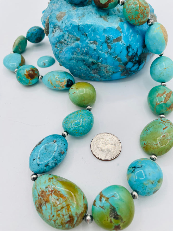 Kingman turquoise graduated nugget and sterling silver beaded necklace. U.S. quarter for size reference. Available only from Rockstar Cowgirl online or in store in Cody, Wyoming.