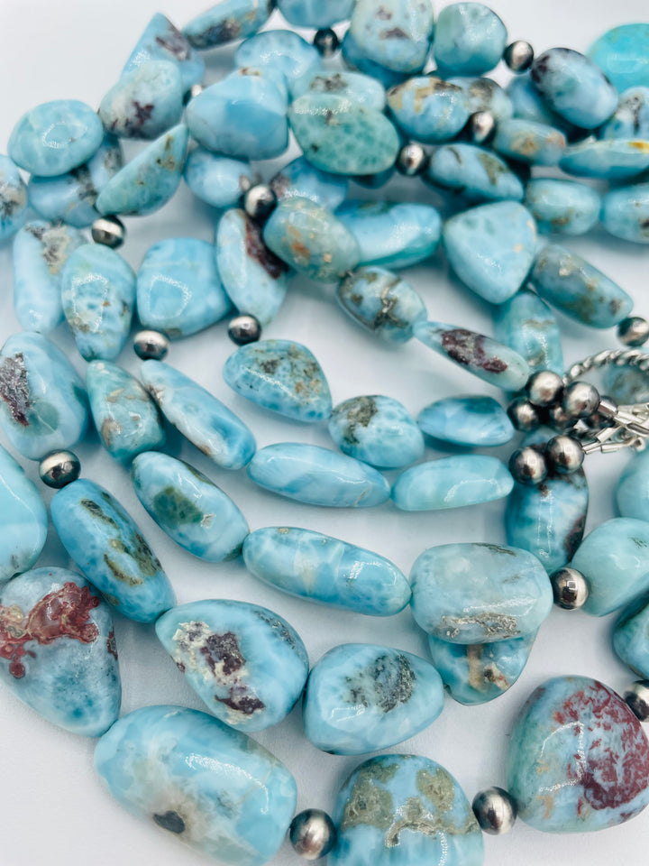 Beaded 3 strand necklace featuring smooth larimar nuggets and sterling silver beads. Available only from Rockstar Cowgirl online or in store in Cody, Wyoming.