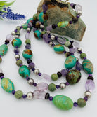 3 strand chunky necklace featuring green Kingman turquoise, African turquoise, brown opal, pink amethyst vintage sterling silver, cape amethyst, and dark amethyst. Available only rom Rockstar Cowgirl online or in store in Cody, Wyoming. 