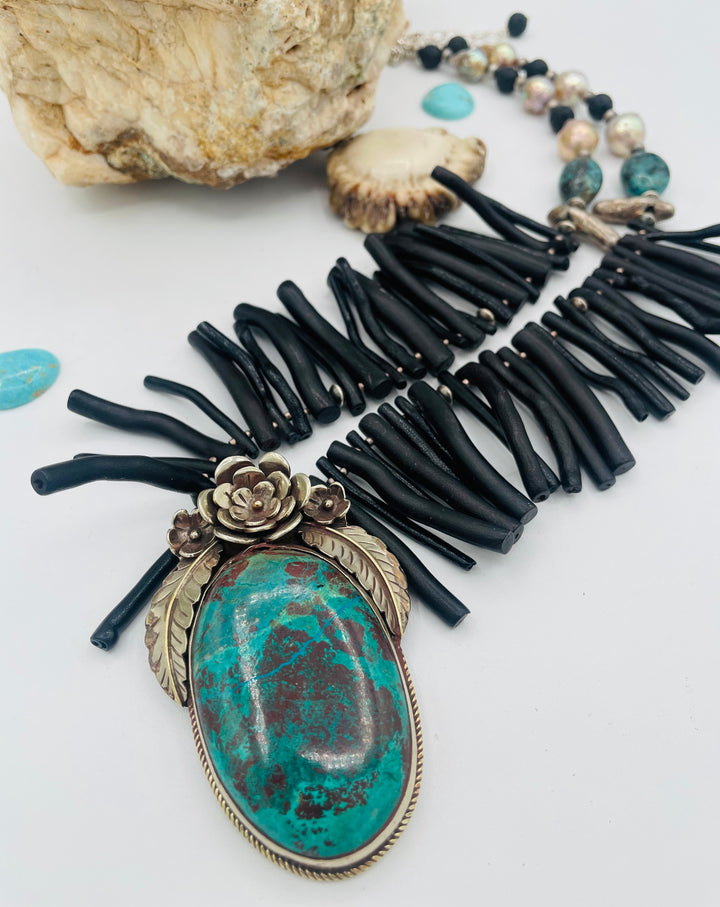 Beaded necklace featuring black coral sticks, smokey Kingman turquoise, sterling silver beads, lava, natural luster pearls, with a chrysocolla and Bali silver pendent. Available only from Rockstar Cowgirl online or in store in Cody, Wyoming.