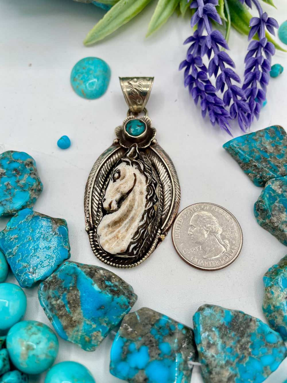 Bead box featuring Kingman turquoise, Sonoran turquoise, sodalite, spiney oyster, red jasper, bronzite, and a bone horse pendent. U.S. quarter for size reference. Available only from Rockstar Cowgirl online or in store in Cody, Wyoming