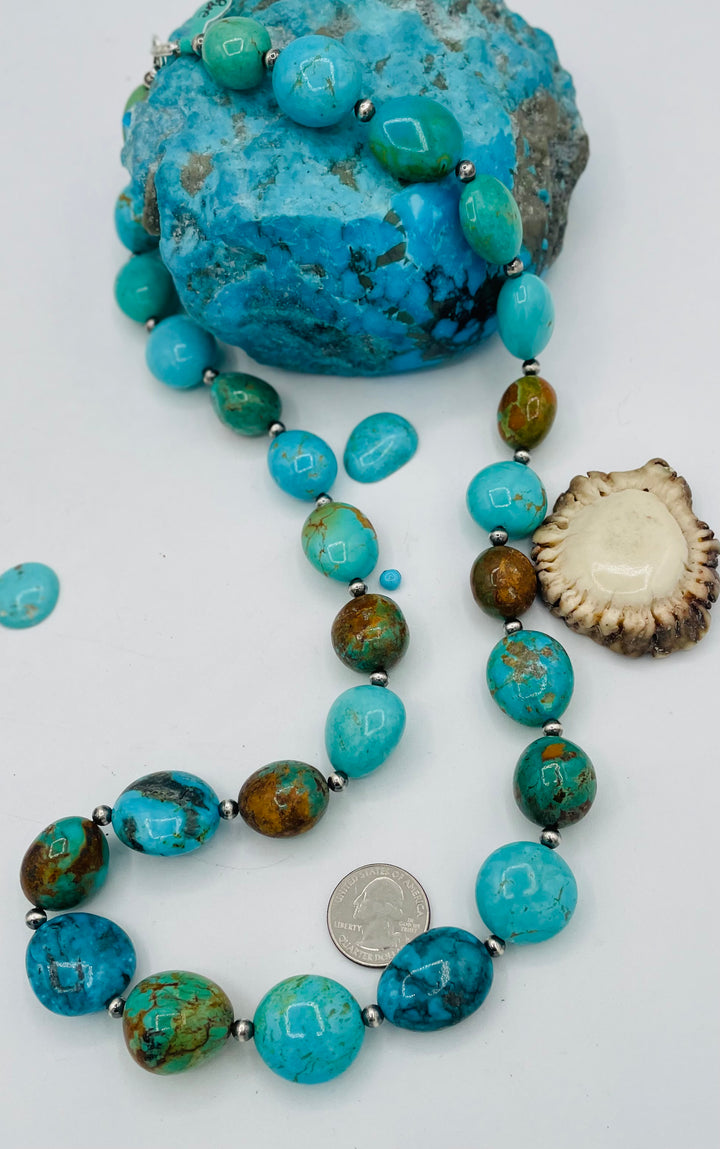 Kingman turquoise graduated nugget and sterling silver beaded necklace. U.S. quarter for size reference. Available only from Rockstar Cowgirl online or in store in Cody, Wyoming.