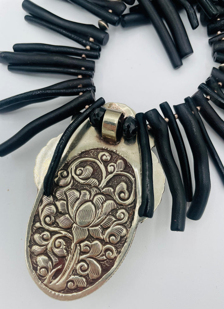 Beaded necklace featuring black coral sticks, smokey Kingman turquoise, sterling silver beads, lava, natural luster pearls, with a chrysocolla and Bali silver pendent. Available only from Rockstar Cowgirl online or in store in Cody, Wyoming.