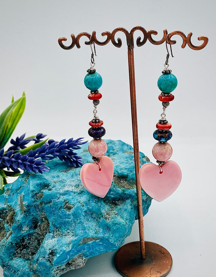 Handmade earrings featuring pink conch shell hearts, rhodochrosite, purple Mojave/ Mohave Kingman turquoise, and spiny oyster beads.  Available only from Rockstar Cowgirl online or in store in Cody, Wyoming.