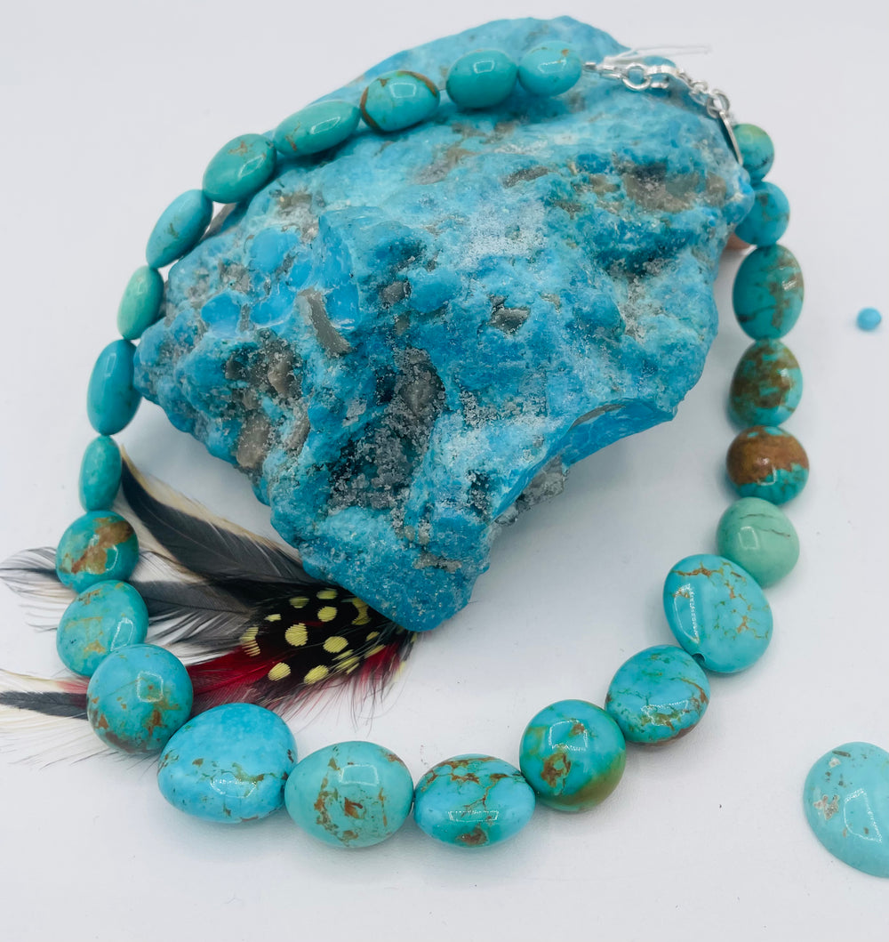 Graduated beaded necklace featuring Kingman turquoise with gold matrix in shades of blue and green. Available only from Rockstar Cowgirl online or in store in Cody, Wyoming.