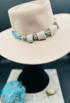 Beaded hatband with giant elk antler beads, Campitos turquoise, lapis, sterling silver, and Bali silver beads finished with leather lace and slide bead for fit. Available only from Rockstar Cowgirl online or in store in Cody, Wyoming.