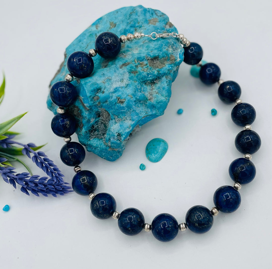 Beaded necklace featuring large Afghan lapis round beads with sterling silver beads between. Available only from Rockstar Cowgirl online or in store in Cody, Wyoming.
