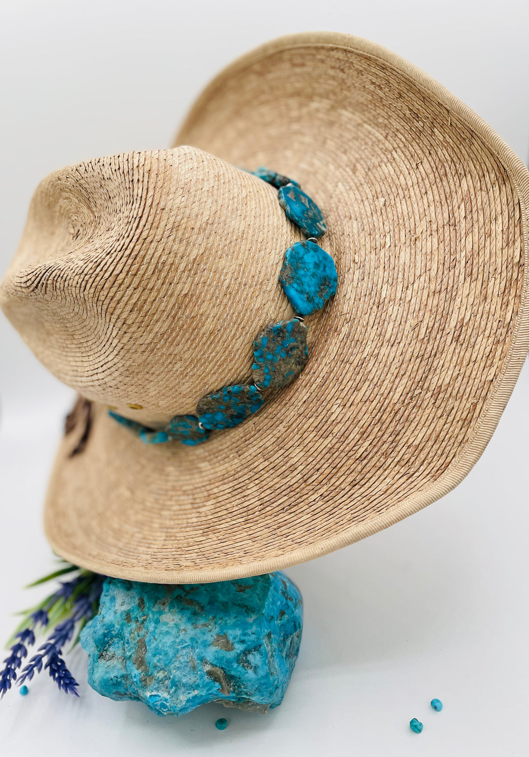 Beaded adjustable hatband that doubles as a necklace featuring Ithaca Peak turquoise and sterling silver Navajo pearl beads with deer lace in the back. Available only from Rockstar Cowgirl online or in store in Cody, Wyoming. 