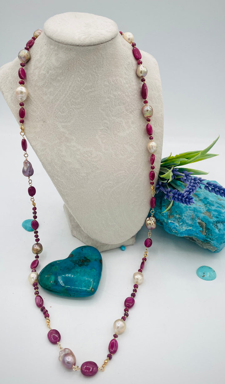 Silk knotted treasure necklace featuring rubies and natural luster Edison pearls. Available only from Rockstar Cowgirl online or in store in Cody, Wyoming.