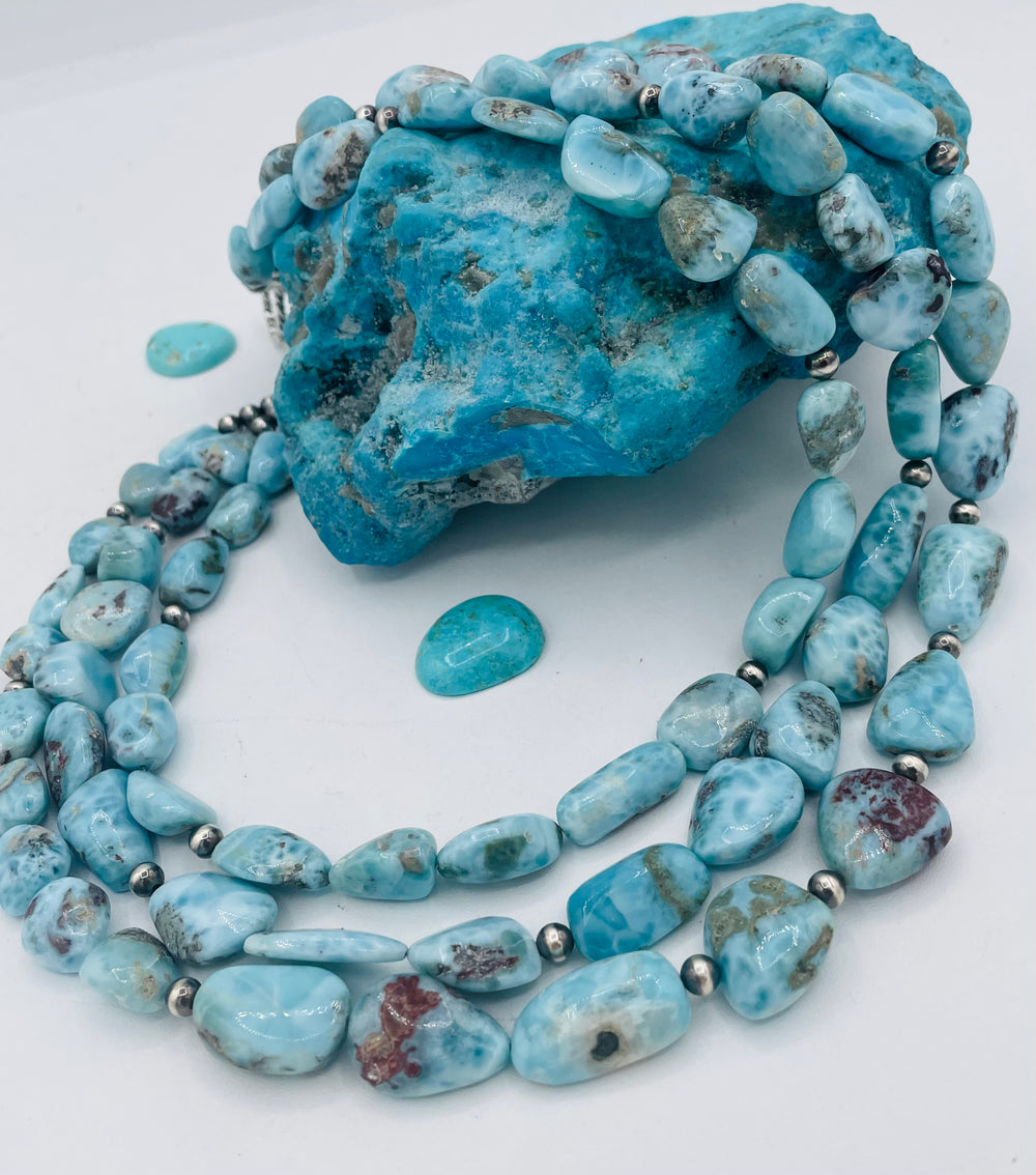Beaded 3 strand necklace featuring smooth larimar nuggets and sterling silver beads. Available only from Rockstar Cowgirl online or in store in Cody, Wyoming.