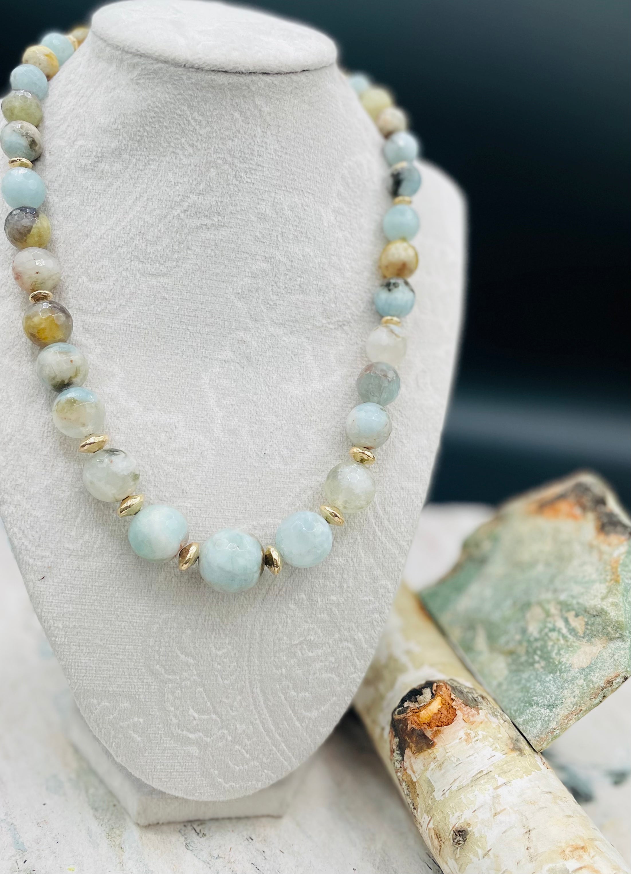 Aquamarine graduated round beaded necklace with hammered 14k gold beads sprinkled throughout. Available only from Rockstar Cowgirl online or in store in Cody, Wyoming.