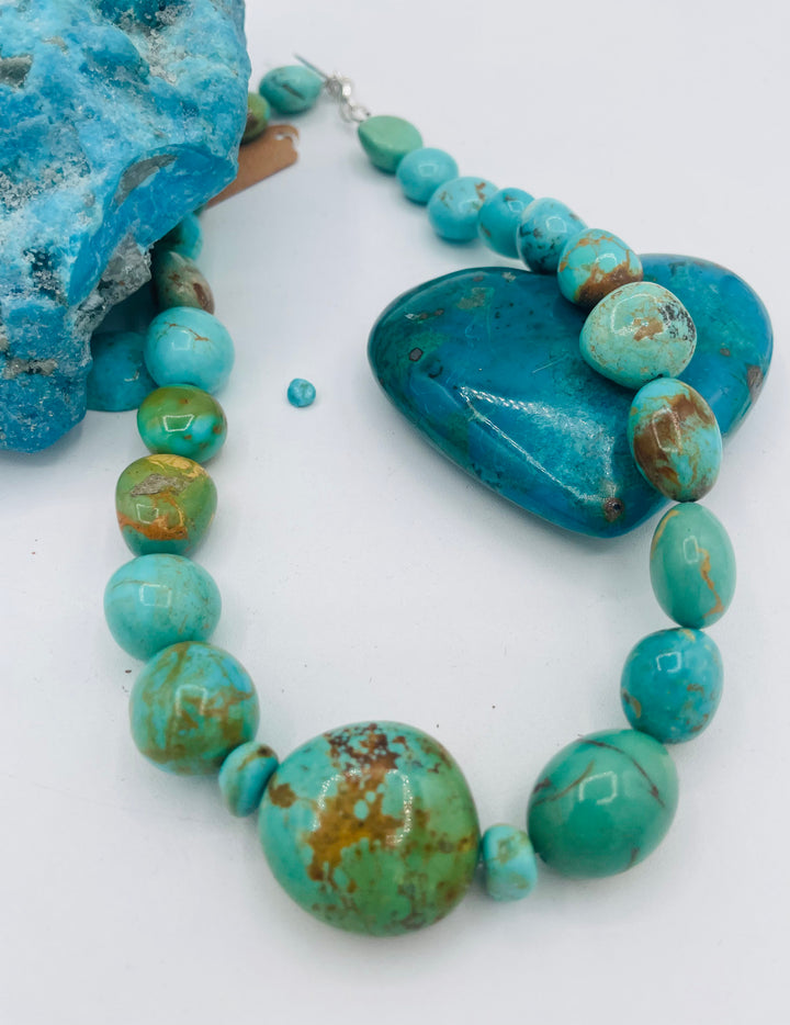 Graduated beaded necklace featuring Kingman turquoise with gold matrix in shades of blue and green. Available only from Rockstar Cowgirl online or in store in Cody, Wyoming.