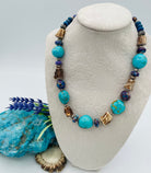 Necklace featuring Kingman turquoise, purple Mojave turquoise, rough deer antler, lapis, and sterling silver beads. Available only from Rockstar Cowgirl online or in store in Cody, Wyoming.