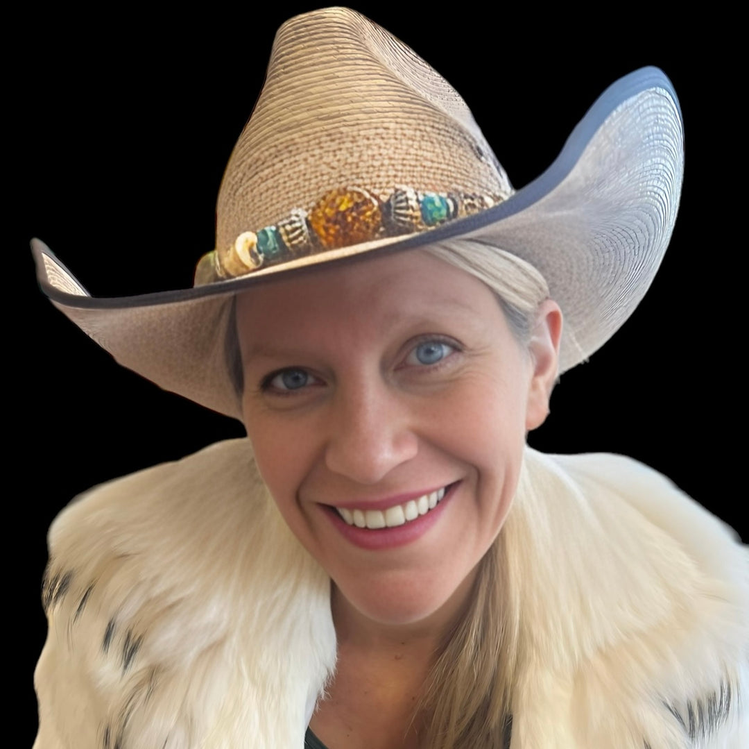 Highlighting the large Baltic amber and the Hill tribe sterling silver beads in the center front of the hatband. Available only from Rockstar Cowgirl online or in store in Cody, Wyoming.