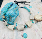 Beaded hatband with giant elk antler beads, Campitos turquoise, lapis, sterling silver, and Bali silver beads finished with leather lace and slide bead for fit. Available only from Rockstar Cowgirl online or in store in Cody, Wyoming.