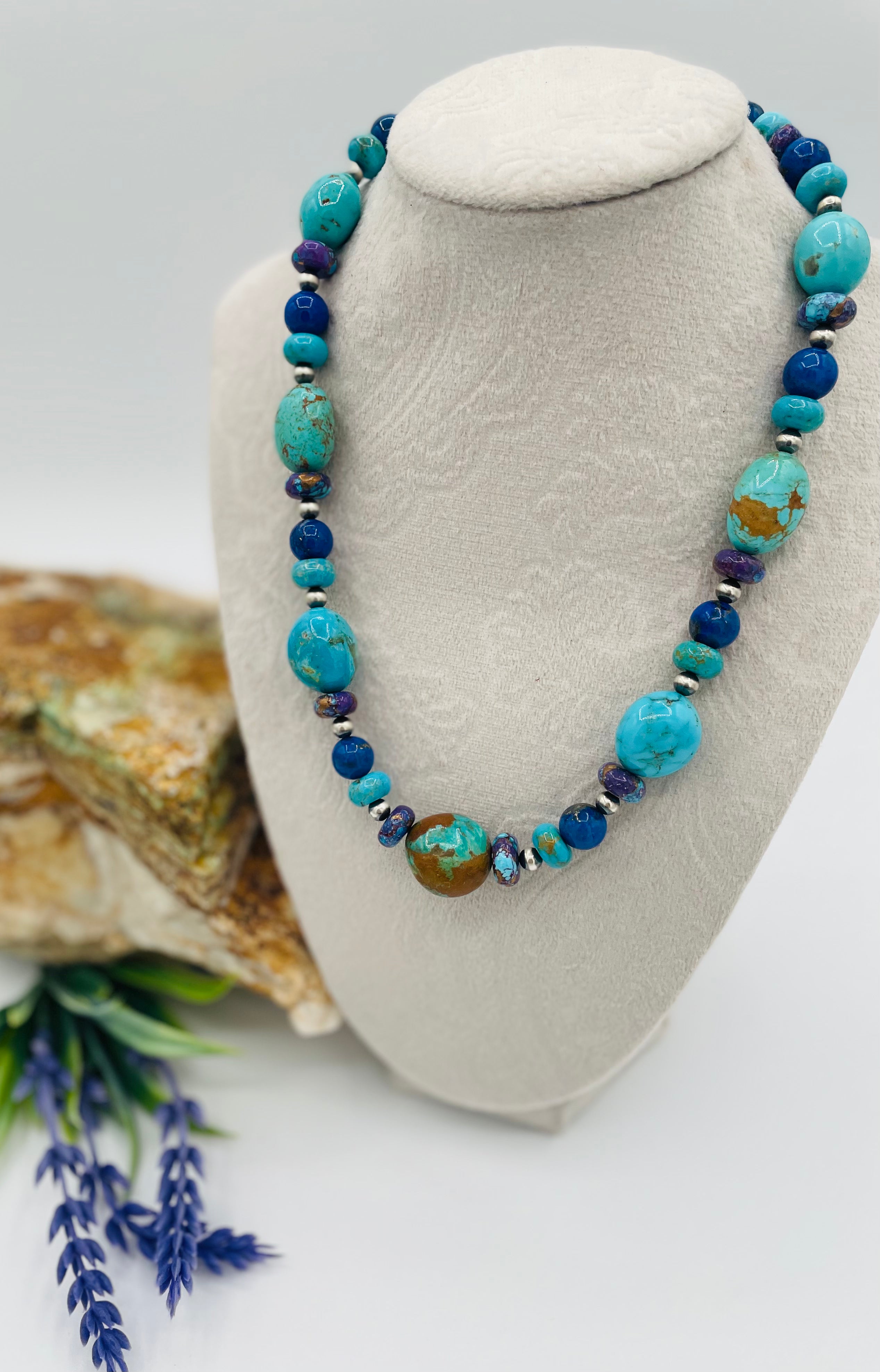 Necklace featuring Kingman turquoise with gold matrix, purple Mojave turquoise, lapis, and sterling silver Navajo pearl beads. Available only from Rockstar Cowgirl online or in store in Cody, Wyoming.